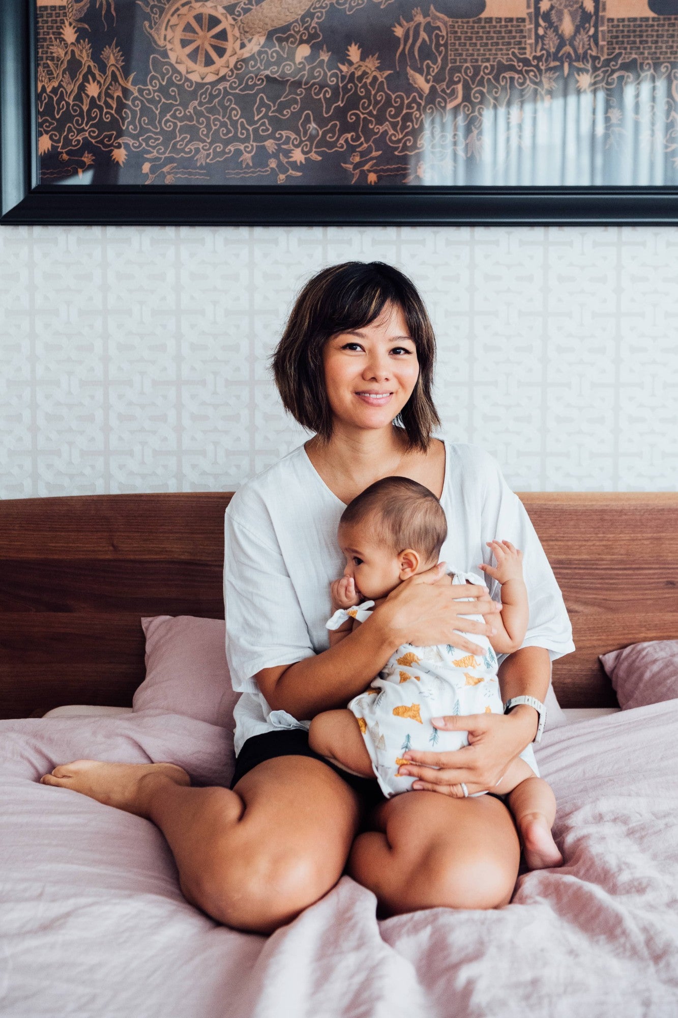 Dr Cheryl Kam holding her baby