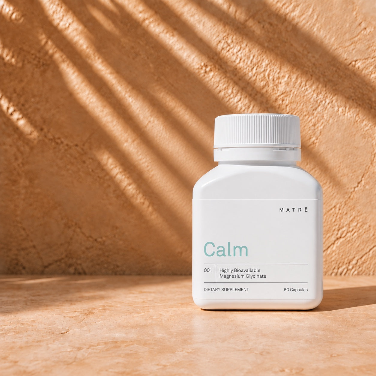 Matrē Calm magnesium glycinate bottle with mint-green lettering, 60 capsules