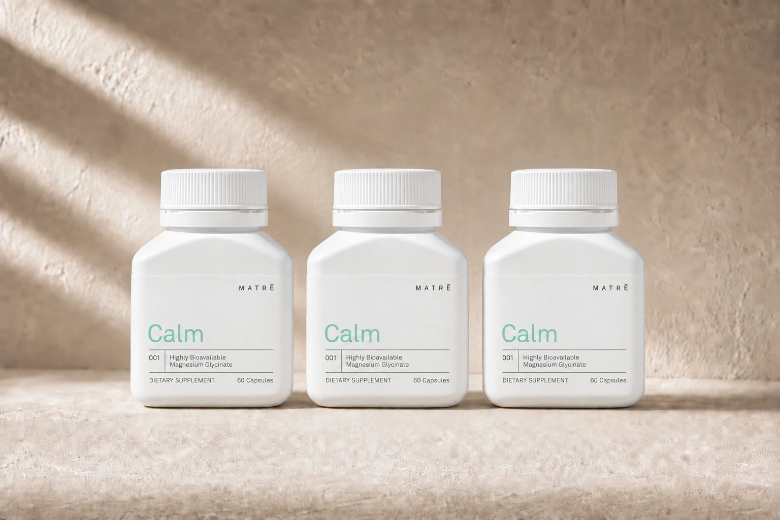 Three matching Matrē Calm bottles