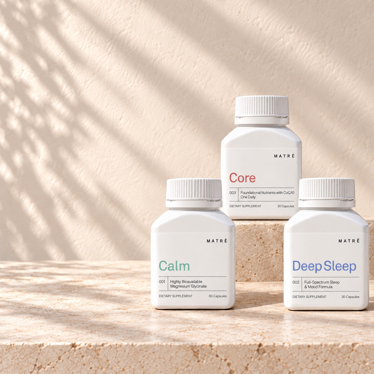 Calm, Deep Sleep and Core together on stone plinths
